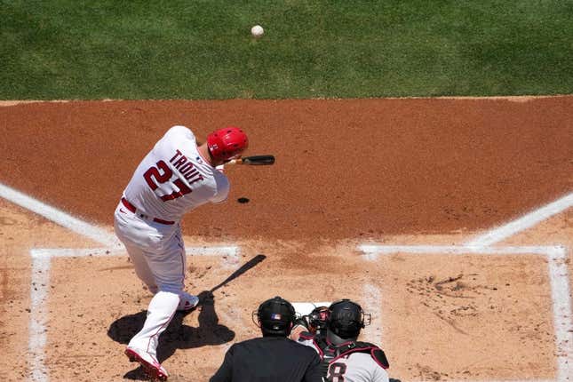 Jul 2, 2023; Anaheim, California, USA; Los Angeles Angels center fielder Mike Trout (27) hits a solo home run in the first inning against the Arizona Diamondbacks at Angel Stadium.
