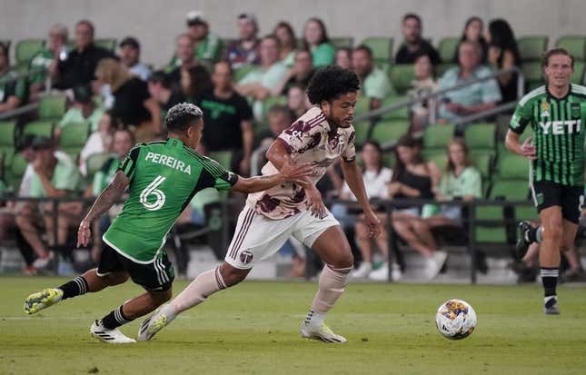 Sep 17, 2023; Austin, Texas, USA; Portland Timbers midfielder Evander (20) dribbles against Austin FC midfielder Daniel Pereira (6) during the second half at Q2 Stadium.