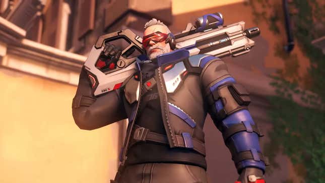 Soldier 76 poses with his rifle over his shoulder. 