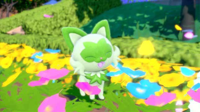 Sprigatito smiles while standing in flowers in Pokémon Scarlet and Violet.