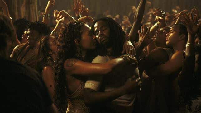Nona Gaye and Harold Perrineau dancing close in the zion rave