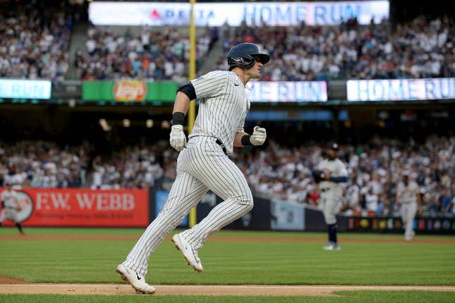 Aug 3, 2023; Bronx, New York, USA; New York Yankees left fielder Billy McKinney (57) rounds the bases after hitting a solo home run against the Houston Astros during the first inning at Yankee Stadium.