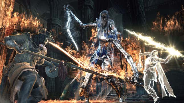 An image of two Dark Souls 3 players battling against a screen-sized boss.