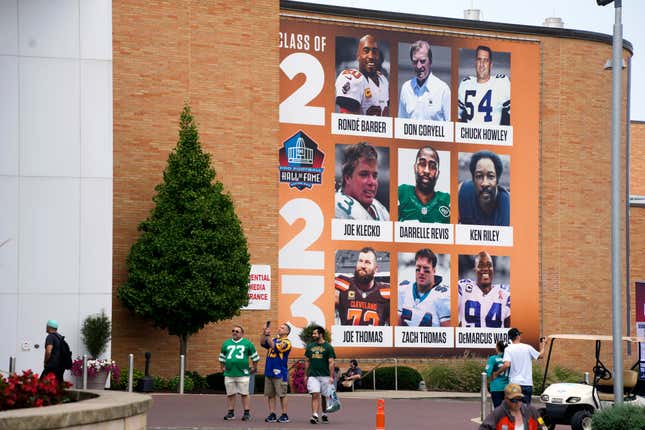 Football fans visit the Pro Football Hall of Fame before the Cleveland Browns and the New York Jets square off