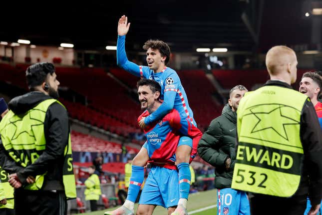 Stefan Savic of Atletico Madrid Joao Felix of Atletico Madrid celebrate after beating Manchester United.