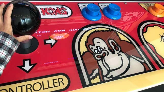 The Strong Museum's giant Donkey Kong arcade game features a massive control panel.
