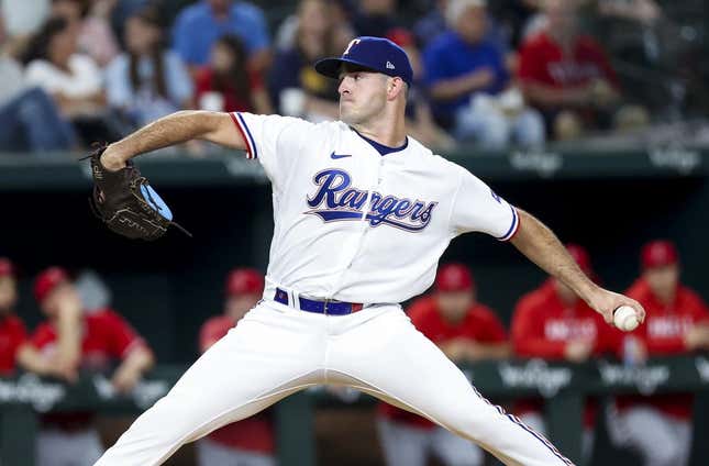 Jun 13, 2023; Arlington, Texas, USA;  Texas Rangers starting pitcher Cody Bradford (61) throws during the first inning against the Los Angeles Angels at Globe Life Field.