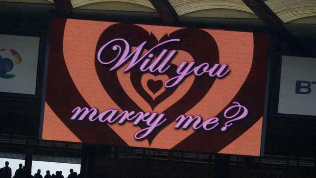 Image for article titled What It Really Costs to Propose on a Jumbotron (and Better Ways to Spend That Money)