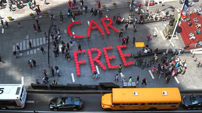 The Times Square Alliance shows off a street art display, spelling out Car Free in street furniture, in Times Square in New York on April 21, 2016 as a testament to one of the first Car Free street spaces in recent history.