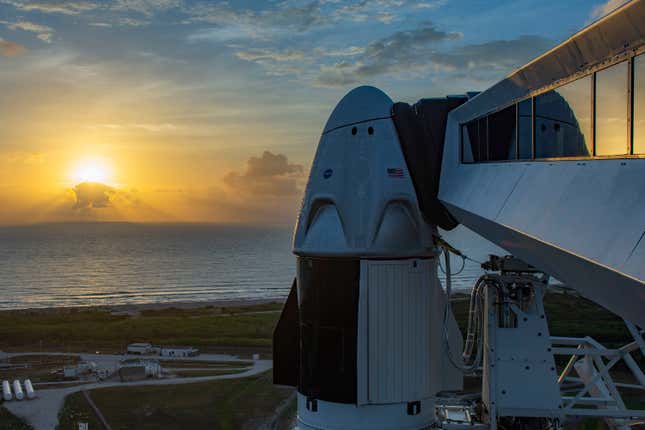 The crew Dragon spacecraft waits for its passengers on the launch pad.