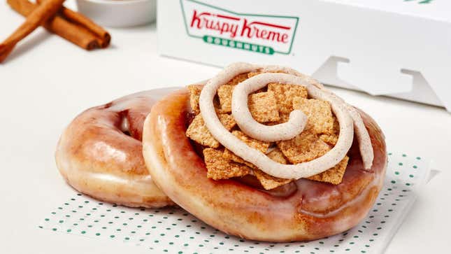 Krispy Kreme cinnamon rolls in front of Krispy Kreme box