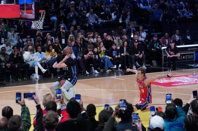 Feb 18, 2023; Salt Lake City, UT, USA; Philadelphia 76ers guard Mac McClung (9) competes in the Dunk Contest during the 2023 All Star Saturday Night at Vivint Arena.