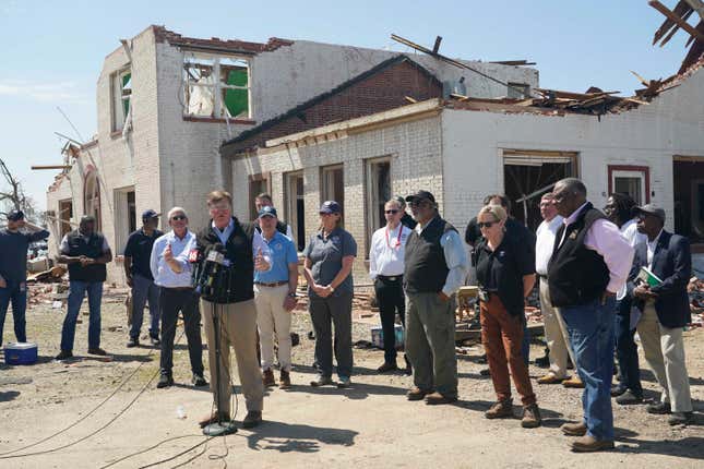 Mississippi Gov. Tate Reeves speaks to reporters, Sunday, March 26, 2023 in Rolling Fork, Mississippi, about the Friday night tornado that hit the town and other areas. 