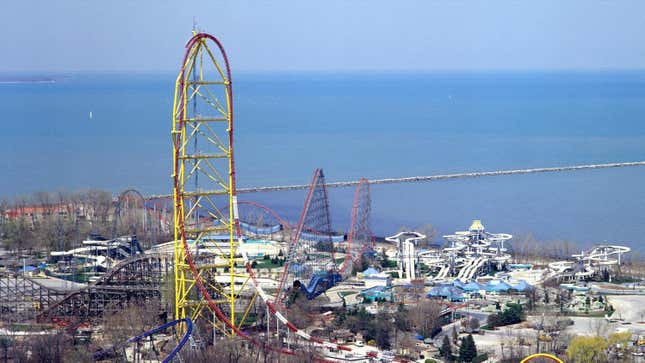 The Top Thrill Dragster, with Lake Erie as a backdrop. The notably larger red-framed coaster is the Magnum XL-200.