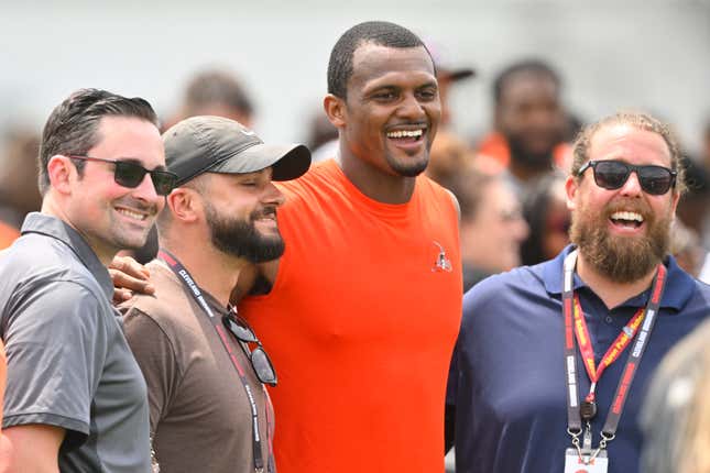 Cleveland Browns quarterback Deshaun Watson poses for a picture with fans after an NFL football practice at the team’s training facility Wednesday, June 8, 2022, in Berea, Ohio.