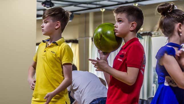 Image for article titled Lowly 9-Year-Olds Gaze Longingly At Elite Few Chosen To Bowl In Birthday Boy’s Lane