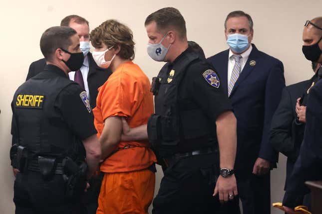 Payton Gendron is escorted away after a hearing at the Erie County Courthouse on May 19, 2022, in Buffalo, New York. Gendron is accused of killing ten people and wounding another three during a shooting at a Tops supermarket on May 14 in Buffalo.