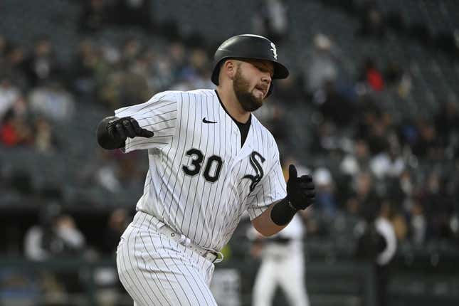 Apr 27, 2023; Chicago, Illinois, USA; Chicago White Sox third baseman Jake Burger (30) reacts after hitting a home run against the Tampa Bay Rays during the fourth inning at Guaranteed Rate Field.