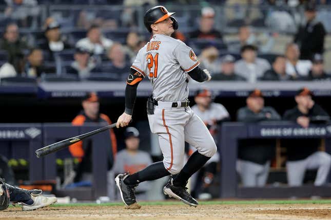 May 25, 2023; Bronx, New York, USA; Baltimore Orioles left fielder Austin Hays (21) follows through on a two run double against the New York Yankees during the eighth inning at Yankee Stadium.