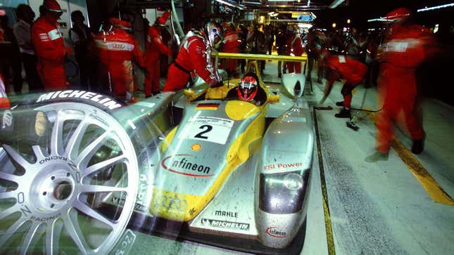 Tyre change for Johnny Herbert in the #2 Audi Sport R8 during the Le Mans 24-hour endurance race at the Circuit de la Sarthe in Le Mans, France on June 15, 2002. The sister #1 car went on to win this race, marking Audi's third-consecutive victory with the dominant R8 prototype at the start of the new millennium.