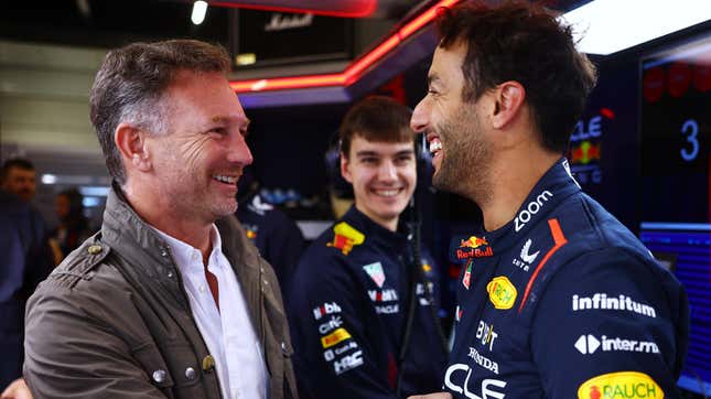 Daniel Ricciardo of Australia and Oracle Red Bull Racing speaks with Red Bull Racing Team Principal Christian Horner as he prepares to drive during Formula 1 testing at Silverstone Circuit on July 11, 2023 in Northampton, England.
