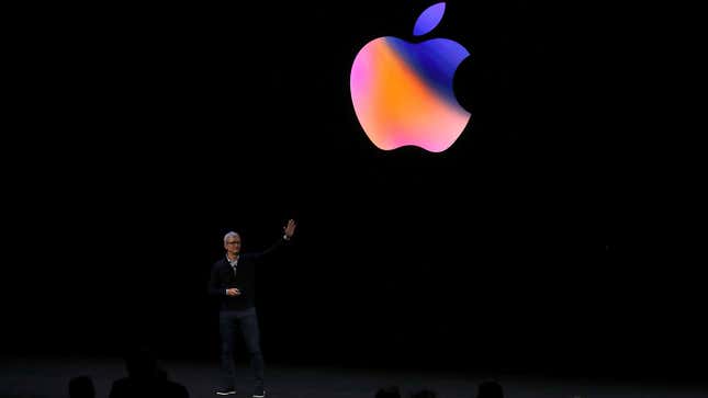 Apple CEO Tim Cook on stage at an event.