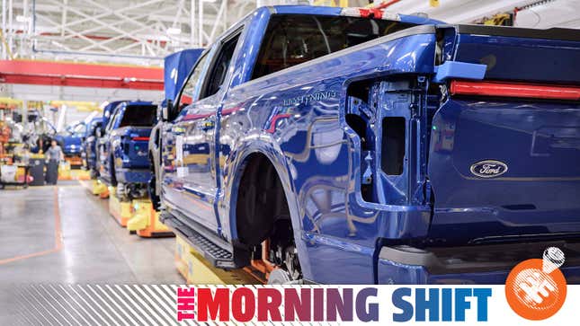 A photo of electric Ford pickups at an assembly plant in the US. 