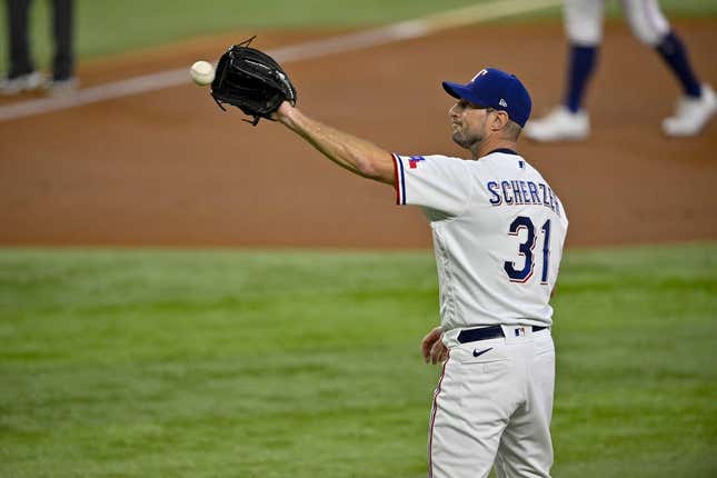 Aug 3, 2023; Arlington, Texas, USA; Texas Rangers starting pitcher Max Scherzer (31) pitches against the Chicago White Sox during the first inning at Globe Life Field.