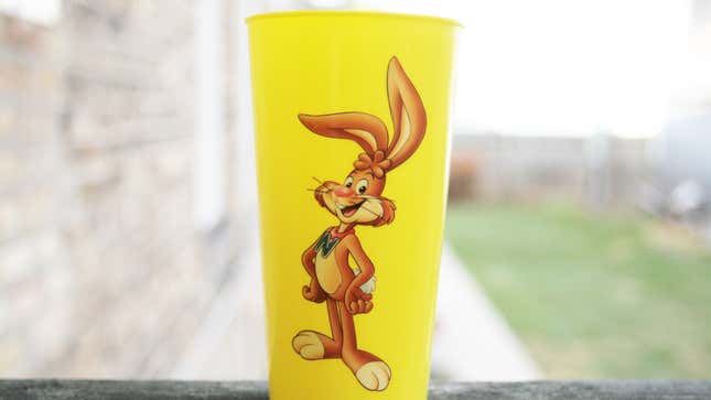 Yellow Nesquik cup with Quicky the Bunny on it