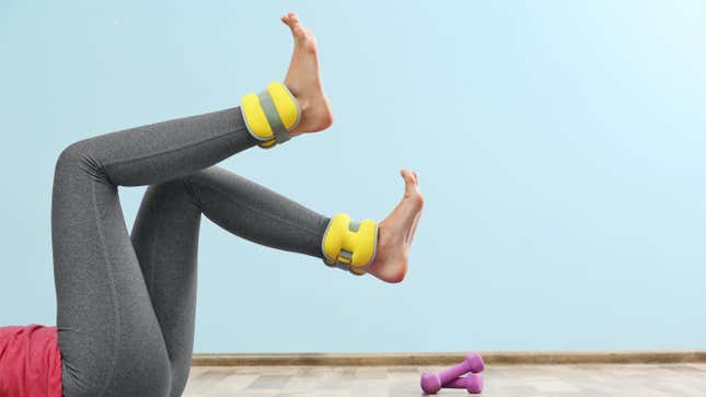 person exercising with ankle weights