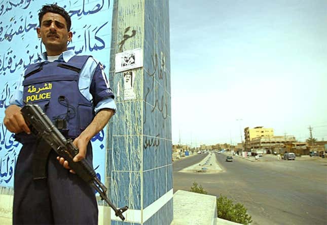 Hassim waves several Total Islamic War coworkers through a checkpoint.