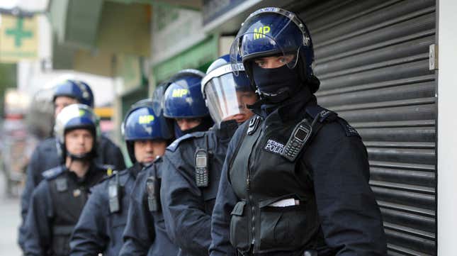 Metropolitan Police officers preparing a raid in London in 2011.