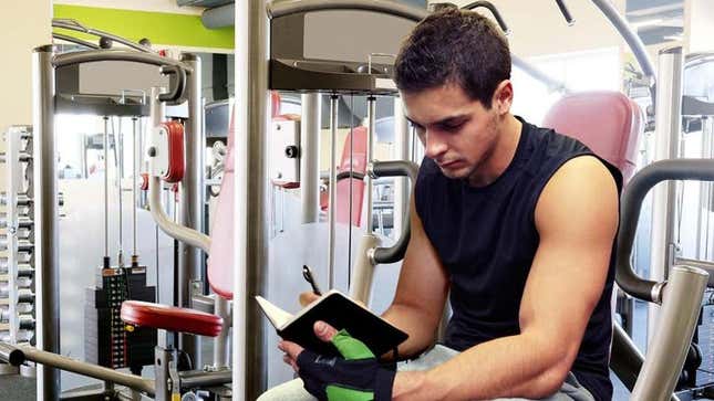 Image for article titled Guy At Gym Has Precious Little Diary To Keep Track Of All His Exercises