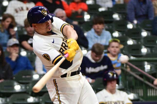 May 25, 2023; Milwaukee, Wisconsin, USA; Milwaukee Brewers shortstop Willy Adames (27) hits a double in the fourth inning against the San Francisco Giants at American Family Field.