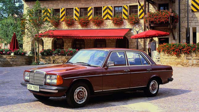 A photo of a red Mercedes sedan. 