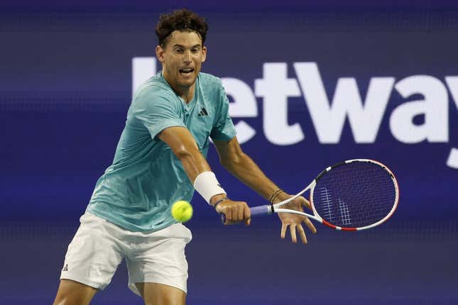 Mar 23, 2023; Miami, Florida, US; Dominic Thiem (AUT) hits a backhand against Lorenzo Sonego (ITA) (not pictured) on day four of the Miami Open at Hard Rock Stadium.