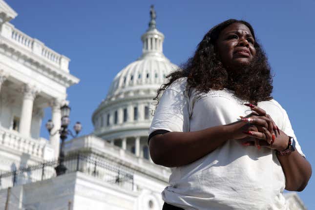  U.S. Cori Bush (D-Mo.) speaks to a reporter outside the U.S. Capitol August 2, 2021 in Washington, DC. Rep. Bush has been camping out at the front steps of the U.S. Capitol to protest the ending of the eviction moratorium. 