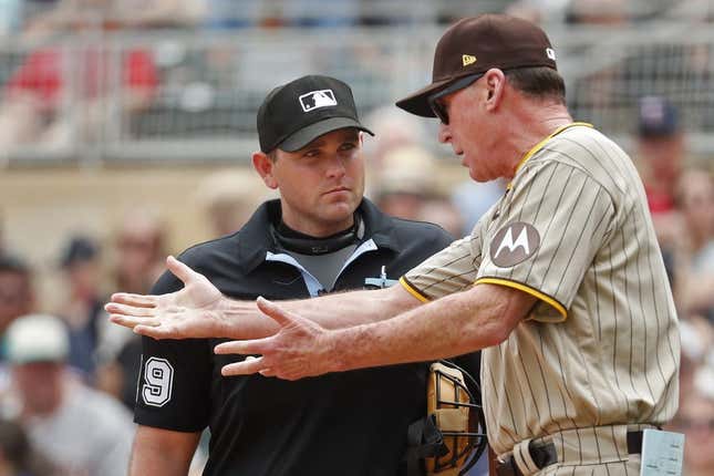 May 11, 2023; Minneapolis, Minnesota, USA; San Diego Padres manager Bob Melvin speaks with home plate umpire Brock Ballou in the eighth inning of the game with the Minnesota Twins at Target Field.