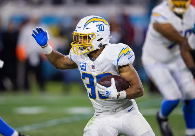 Jan 14, 2023; Jacksonville, Florida, USA; Los Angeles Chargers running back Austin Ekeler (30) against the Jacksonville Jaguars during a wild card playoff game at TIAA Bank Field.