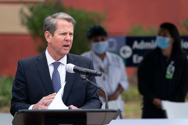 Georgia Gov. Brian Kemp speaks to the media before health care workers receive the Pfizer-BioNTech COVID-19 vaccine outside of the Chatham County Health Department on December 15, 2020, in Savannah, Georgia.
