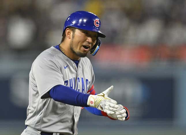 Apr 14, 2023; Los Angeles, California, USA;  Chicago Cubs right fielder Seiya Suzuki (27) rounds the bases after hitting a solo home run in the ninth inning against the Los Angeles Dodgers at Dodger Stadium.