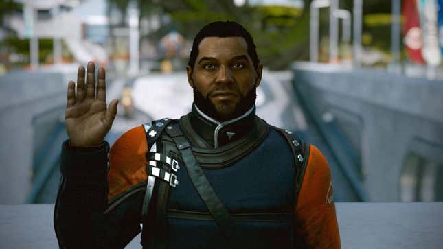 Commander Tuala raises his right hand for the UC Vanguard oath. 