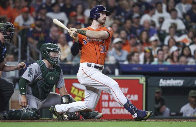May 19, 2023; Houston, Texas, USA; Houston Astros right fielder Kyle Tucker (30) hits an RBI double during the fourth inning against the Oakland Athletics at Minute Maid Park.