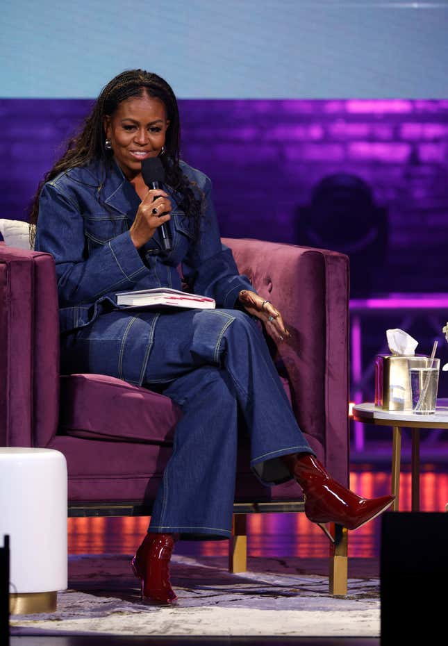 WASHINGTON, DC - NOVEMBER 15: Former First Lady Michelle Obama speaks onstage during the Michelle Obama: The Light We Carry Tour at Warner Theatre on November 15, 2022 in Washington, DC.
