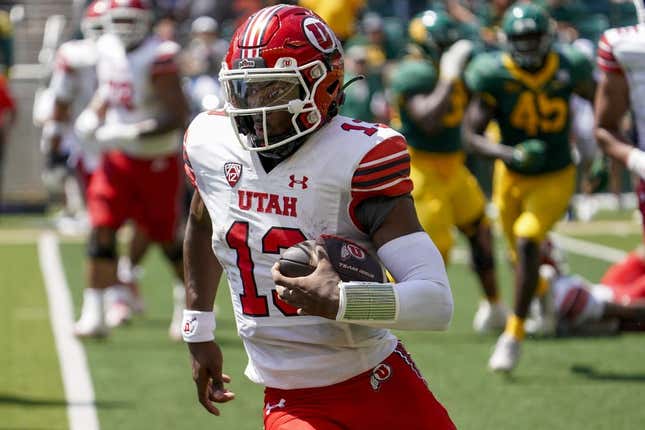 Sep 9, 2023; Waco, Texas, USA; Utah Utes quarterback Nate Johnson (13) carries the ball against the Baylor Bears during the second half at McLane Stadium.
