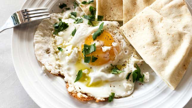 Image for article titled Fry Your Eggs in a Pile of Crumbled Feta