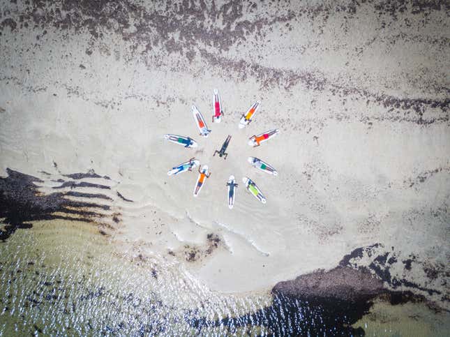 Training how to surf by the beach in Mogadishu
