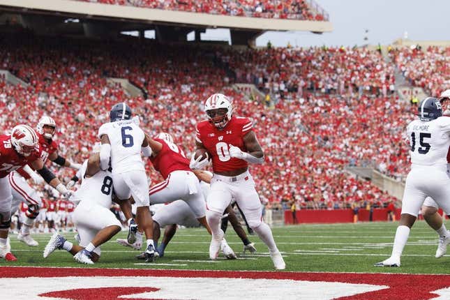 Sep 16, 2023; Madison, Wisconsin, USA; Wisconsin Badgers running back Braelon Allen (0) rushes for a touchdown during the third quarter against the Georgia Southern Eagles at Camp Randall Stadium.