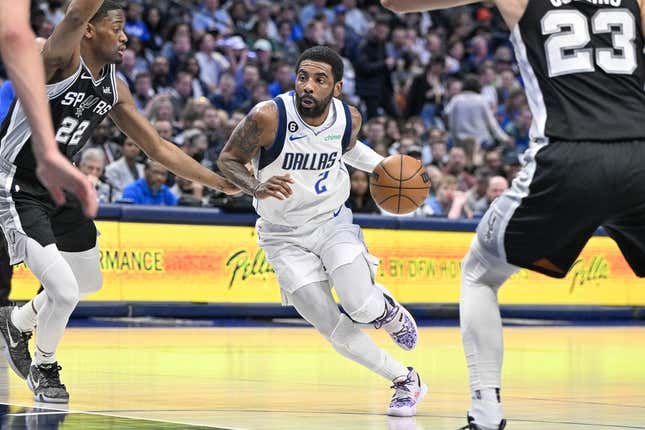 Feb 23, 2023; Dallas, Texas, USA; Dallas Mavericks guard Kyrie Irving (2) in action during the game between the Dallas Mavericks and the San Antonio Spurs at American Airlines Center.