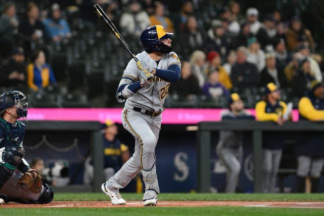 Apr 18, 2023; Seattle, Washington, USA; Milwaukee Brewers left fielder Christian Yelich (22) hits a home run against the Seattle Mariners during the first inning at T-Mobile Park.